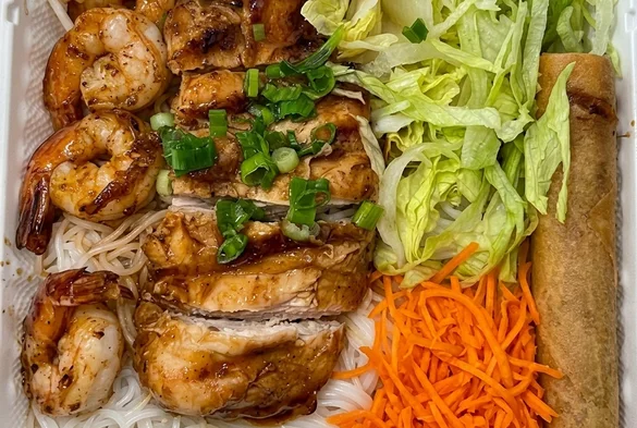 Thai Tai Vietnamese restaurant on 17 Avenue SW in Calgary's Beltline, preparing Vietnamese food for delivery